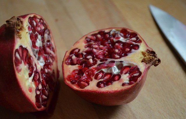 cut pomegranates in half