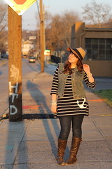 Spring Sunset outfit: striped mariner anchor dress from J.Crew, altered vintage denim vest, brown boots, skinny jeans, wide-brimmed wool hat - Anthropologie "sweaterknit rancher"