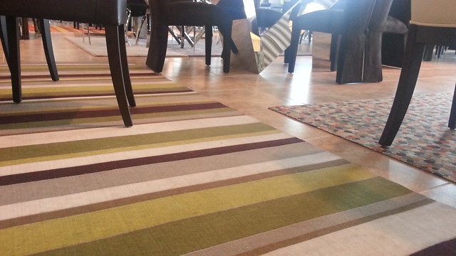 Rugs can bring a little life to a boring room. I'm always scared off by the price. 