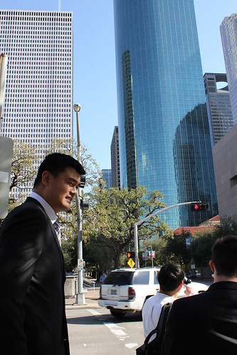 February 15th, 2013 - Yao Ming walks along the streets of downtown Houston