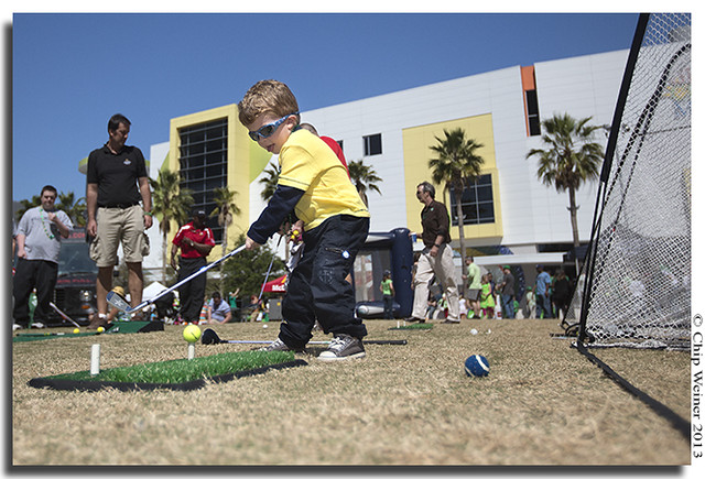 Three-year-old Aidan Ryan tries to improve his golf swing