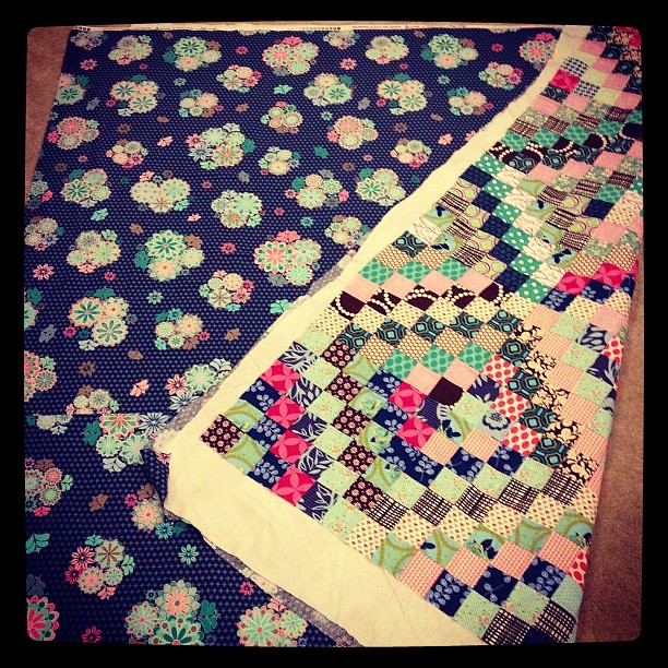 Quilt 4 of 5 basted! I started with the backing and used it as a palette for the front. #scrappytripalong