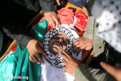 The body of Arafat Jaradat minutes before his funeral