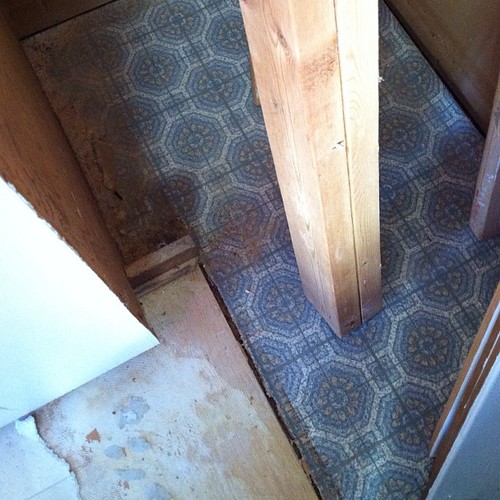 I got a little view of the original floor in my kitchen. Kind of cute all things considered. #renovation #workinprogress