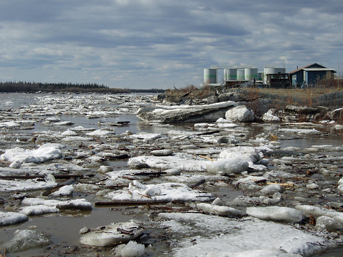 The Yukon River during spring break-up; the tank farm can be seen on the riverbank in the background. Photo by NRCS District Conservationist Joanne Kuykendall.