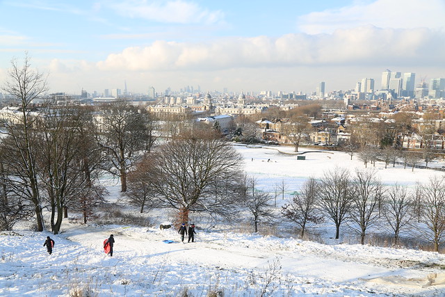 Snowy Greenwich with Canary Wharf and the City behind