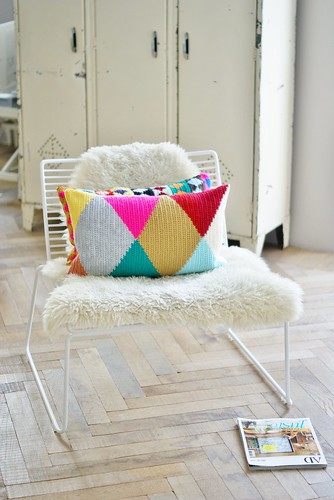harlequin flipped over by wood & wool stool