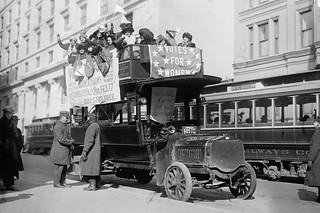 Suffragists on bus in New York City