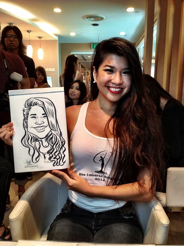 caricature live sketching for Orchard Scotts Dental for Miss Universe Singapore - 2