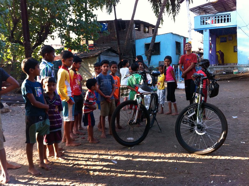 Village kids admire our cycles at Arnala
