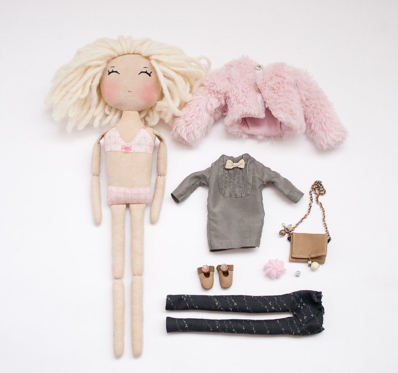 blonde doll and her stuff