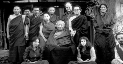 Dilgo Khyentse Rinpoche holding hands with Dagchen  Sakya Rinpoche, Rabjam Rinpoche, Gene Smith, monks, women, photo from documentary on Gene Smith and the preservation of Tibetan books, http://www.lunchboxcity.com/ by Wonderlane