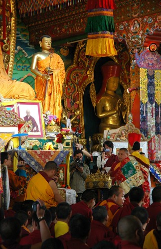 Full mandala offering, monks, lamas, several videographers, statues of the Buddha's students and Sakya Pandita, Sakya Lamdre, Tharlam Monastery of Tibetan Buddhism, Boudha, Kathmandu, Nepal by Wonderlane