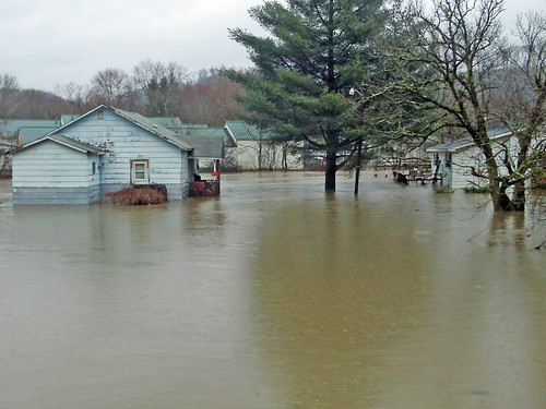 March 13, 2010 -- A subdivision flooded after a storm and subsequent flooding due to the Dunloup Creek. NRCS photo by Mark Bushman.