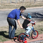Father and son learning to ride a bike!