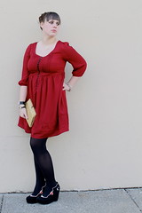 Valentine's Day outfit: red babydoll dress, black opaque tights, face wedges, arrow necklace, vintage gold clutch