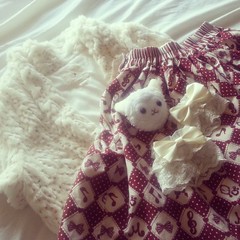 My spoils from the #lolita swap and sell meet - a new #bodyline skirt,  cute sequinned shrug, wrist cuffs, and a handmade #alpaca!