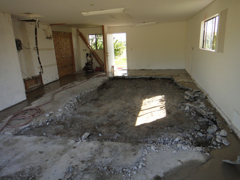 Garage Slab Demolition & Removal In Process