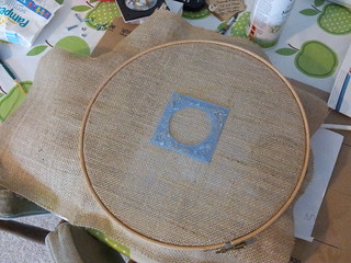 Using embroidery hoop to pull hessian taut before gluing