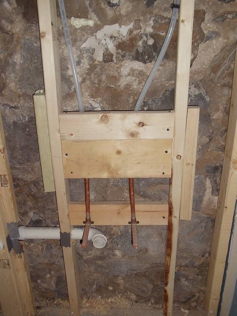 Wiring, HVAC, and plumbing for toilet room.