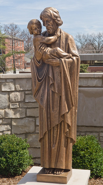 Saint Joseph Roman Catholic Church, in Clayton, Missouri, USA - bronze sculpture of Saint Joseph and the Christ Child - in garden