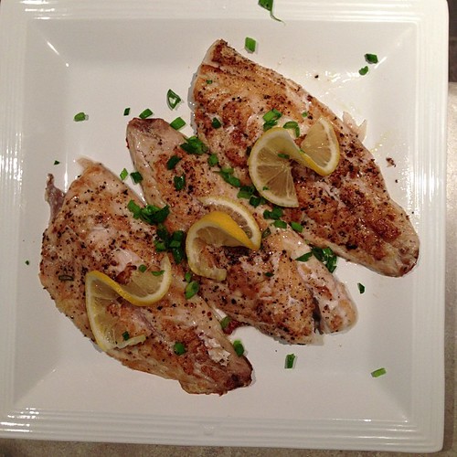 Pan seared red snapper with lemon and green onion.
