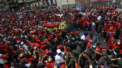 Hundreds of thousands of Venezuelans walk behind the body of President Hugo Chavez on March 6, 2013. The whole of Latin America have paid tribute to the revolutionary leader. by Pan-African News Wire File Photos
