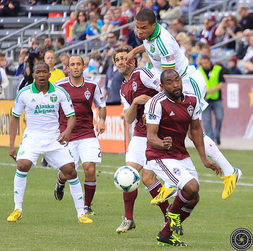 Jump Header by R. Johnson of the Timbers in the Match Colorado Rapids Host Portland Timbers at Dick's Sporting Goods Park Colorado by Corbin Elliott Photography