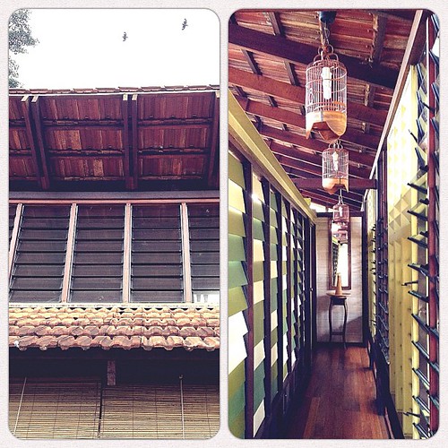 Roof & corridor at Awanmulan. Love the use of louvered windows & slats throughout the house.