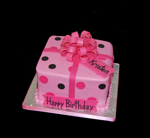 Present cake with black and pink polka dots