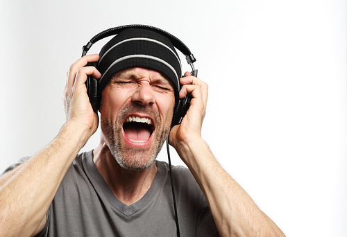 Man Listening To Music With Headphones