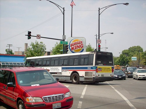 Westbound Chicago Transit Authority Rt # 77 /  Belmont Avenue bus passing the intersection of West Belmont and North Elston Avenues.  Chicago Illinois.  May 2007. by Eddie from Chicago