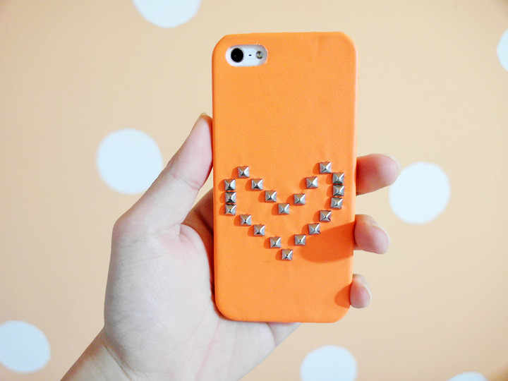 orange iphone cover with studs