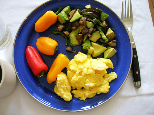 scrambled eggs and mini peppers with avocado, mushroom, and jalapeno hash