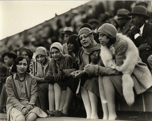 Flappers of different races at a football came