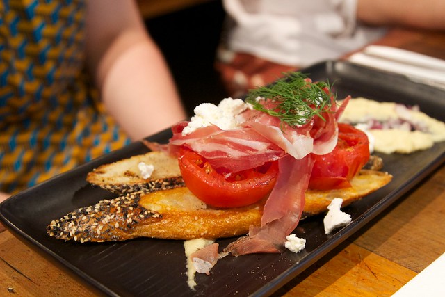 Prosciutto, with tomatoes on toast