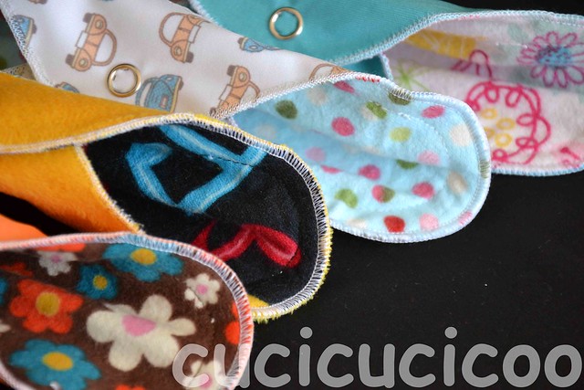 An assortment of colors and designs of cloth pads