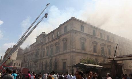 An Egyptian court on fire. The fires are said to be efforts to destroy evidence of crimes implicating the Mubarak government. by Pan-African News Wire File Photos