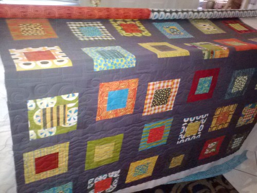 pop of color quilt is finally quilted!