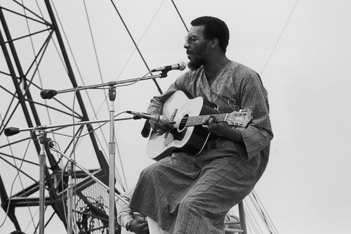 Folk artist Richie Havens opening the Woodstock Music Festival in Bethel, New York on August 15, 1969. Havens died on April 22, 2013. by Pan-African News Wire File Photos