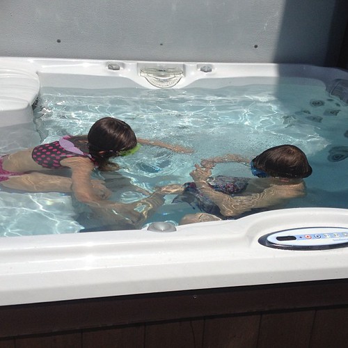 Opened the swimming pool today but kids are swimming in the hot tub cuz the pool is too cold!