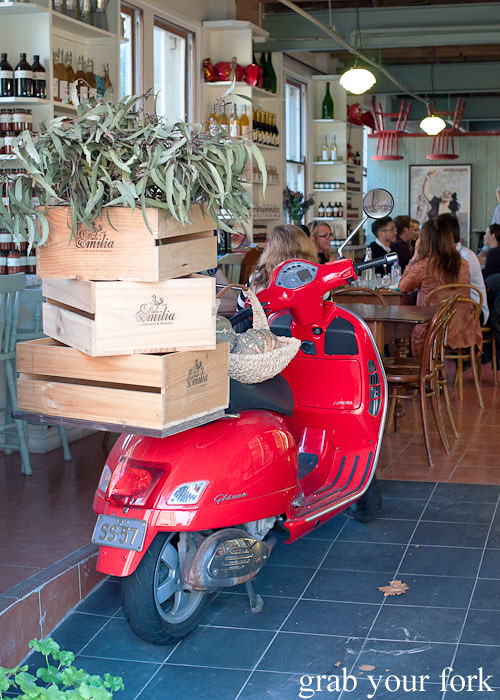 wooden crates and scooter at entrance to pasta emilia surry hills