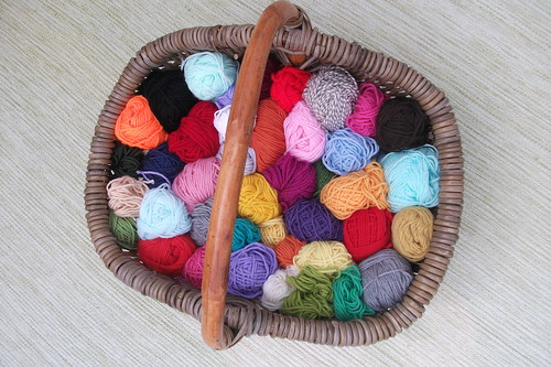 the wool basket by my little red suitcase
