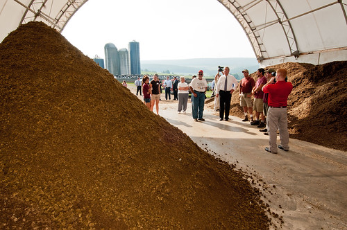  From left: James Ringler, Glenn Stoltzfus, AU.S. Department of Agriculture (USDA) Secretary Tom Vilsack, Duane Stoltzfus and Dwight Stoltzfus. The Stoltzfus brothers explain how the compost solids are produced from their anaerobic digester. An anaerobic digester is a component of a waste management system that captures biogas for energy production a byproduct of this system are compost solids that are used for bedding for the dairy’s cattle. The anaerobic digester practice is part of a planned conservation management system that manages manure and/or comprehensive nutrient management system. Secretary Vilsack visited the Stoltzfus’  Pennwood Dairy Farms on Tuesday, July 17, 2012 to announce the United States Department of Agriculture’s energy efficiency programs and announced a new effort to help rural consumers make affordable, energy-efficient improvements to their homes and businesses. USDA photo by Bob Nichols.
