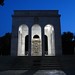 A mausoleum at night