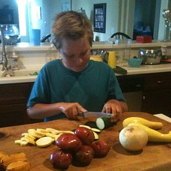Big bro chopping veggies! #kidsinthekitchen #homeschool