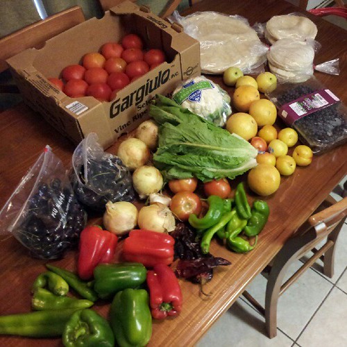 #BountifulBasket this week with added fajita veggie pack, tortillas, & tomatoes: 3 green & 3 red bell peppers, 9 hatch chili's, 5 yellow onions, 1 garlic, 5 dried chili's, 13 lbs of tomatoes, 2 bags of cherries, head of romaine, cauliflower, brussel sprou