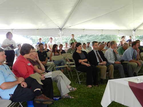 on left - Judith Canales, Acting Deputy Under Secretary for Rural Development in front row with Gregg MacPherson, Area Director and Molly Lambert, State Director – on right – congressional staff Ivey Jones-Congressman Bass, Sean Thomas-Congressman Guinta, Matt Leahy-Senator Shaheen, and Simon Thompson-Senator Ayotte with community attendees at the New Hampshire 150th USDA Anniversary Observance.