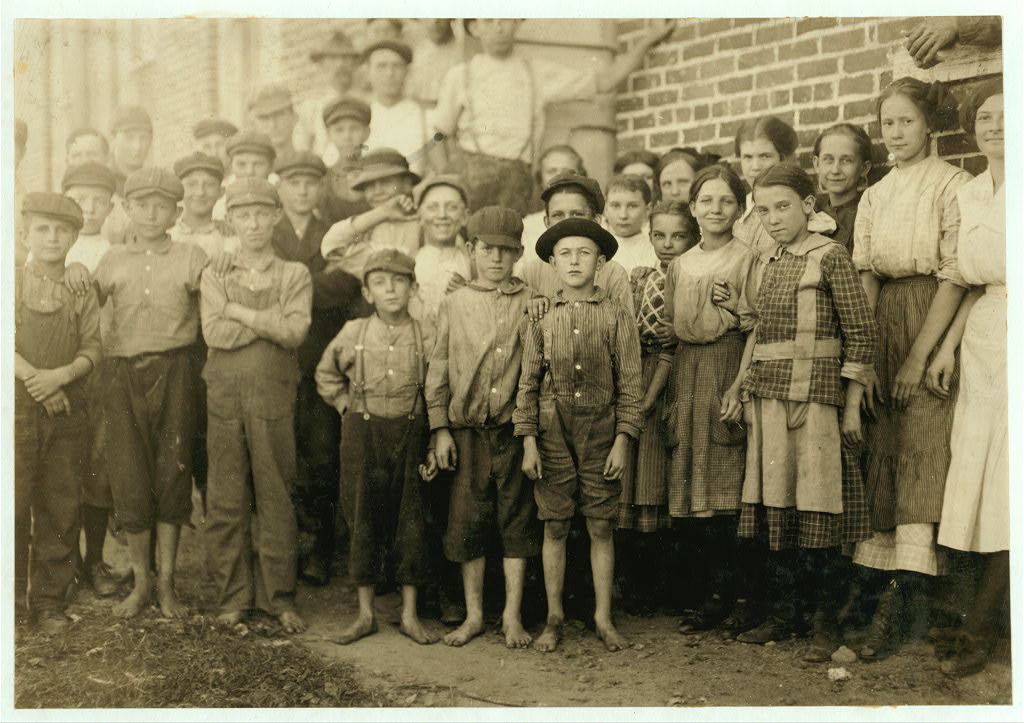 Groups of workers in Clayton (N.C.) Cotton Mills. Every one went in to work when whistle blew, and I saw most of them at work during the morning when I went through. Mr. W.H. Swift talked with a boy recently who said he was ten years old and works in the Clayton Cotton Mill, also that others the same age worked. Here they are. I couldn't get the youngest girls in the photos. Clayton is but a short ride from the State Capitol. (The Superintendent watched the photographing without comment.) Clayton, North Carolina.