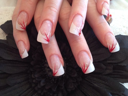 Acrylic Nail Design with Red Flicks